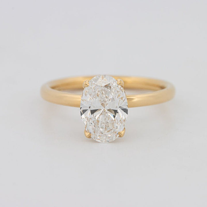 1.50 CT Under - Halo Oval Cut Solitaire (LG) - ZIZOV DIAMONDS