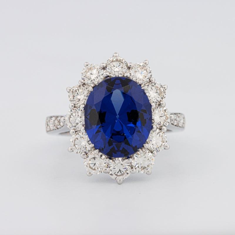 Кольцо-цветок с овальным синим сапфиром 4.60 CT
