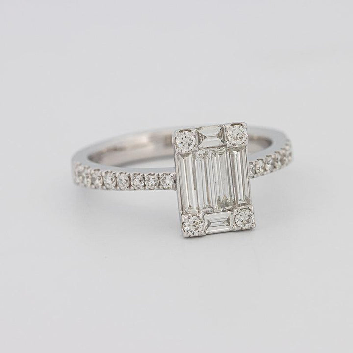 Invisible emerald diamond ring
