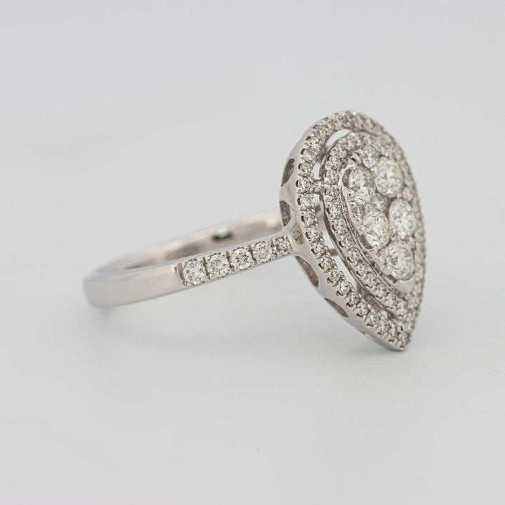 Invisible pearshape diamond ring