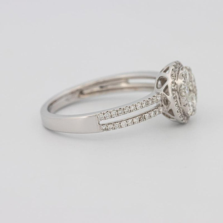 Invisible round halo diamond ring with split band