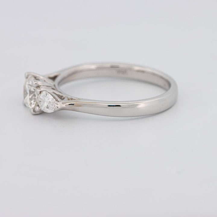 Round Cut Solitaire Ring with Pear-shapes on the sides