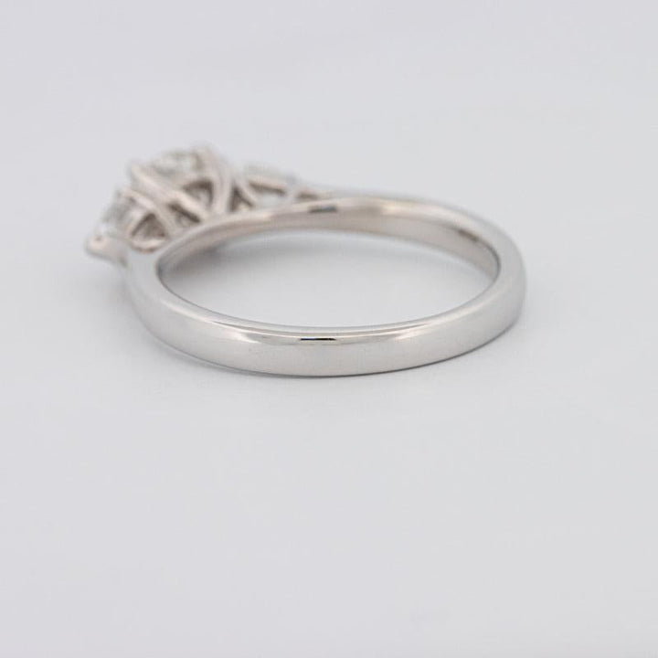 Round Cut Solitaire Ring with Pear-shapes on the sides