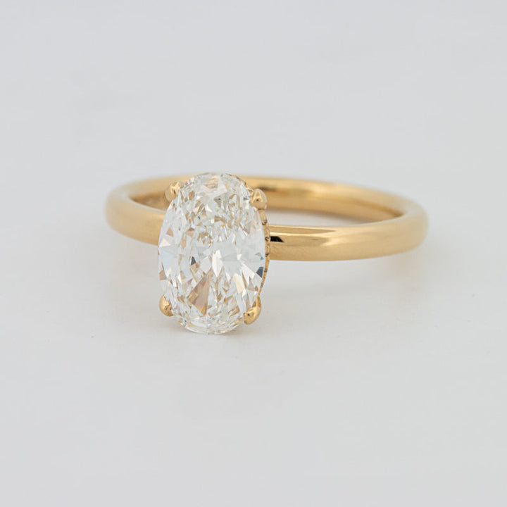 Under Halo Oval Cut Solitaire