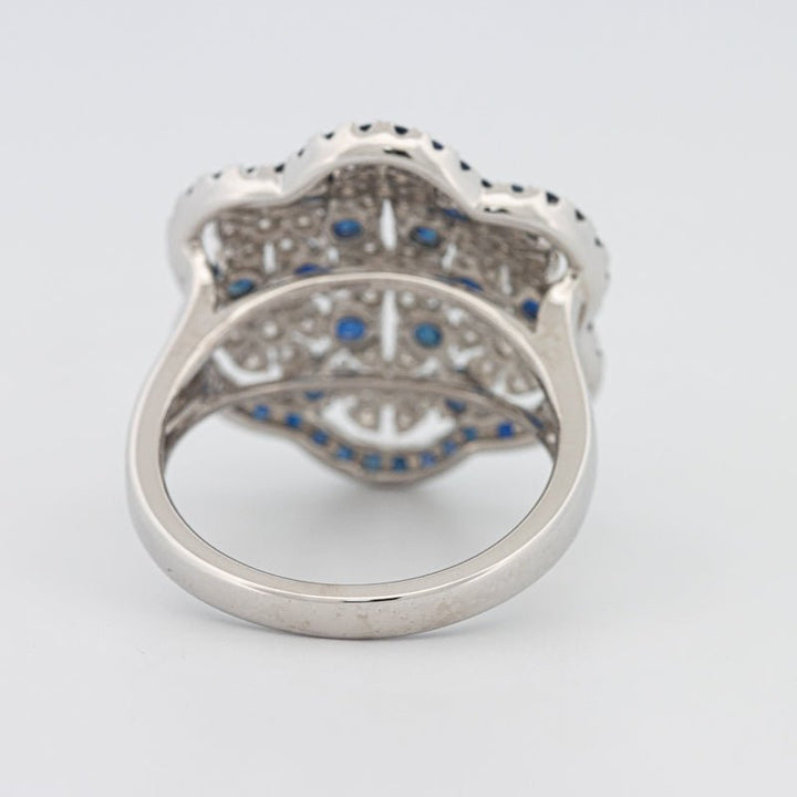 Blue Sapphire and Diamond Flower Ring - ZIZOV DIAMONDS
